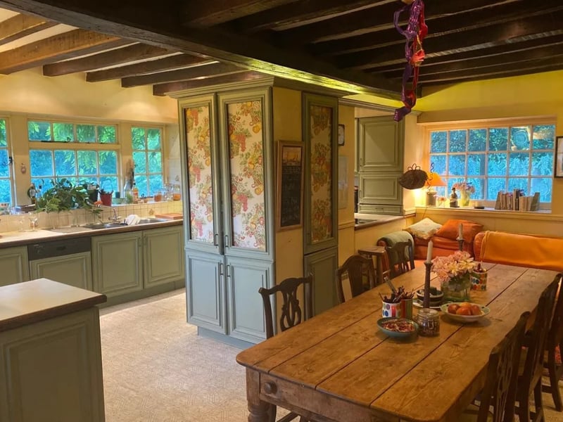 The listing says: "The Garden is especially secluded with various lawns, mature trees and secret areas, with rural views across The Solent to the Isle of Wight from the Top Deck Lawn." 