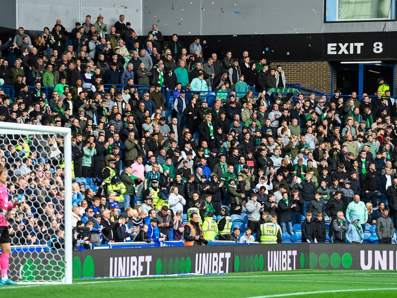 Visiting Hibs fans fill the away end at Ibrox.
