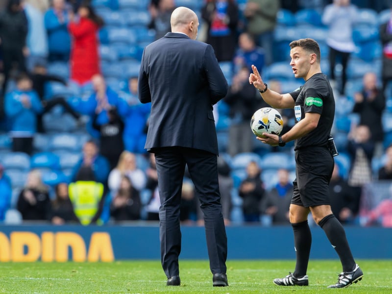 Rangers boss Philippe Clement debates with referee Nick Walsh at the end of the game.