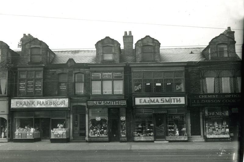Lytham Road shops close to the junction with Waterloo Road. The Lido was further along on the left. According to the plaque this terrace of shops was built in 1892. Seen here in the 1950s the shops include from the left Greenhalgh's ladieswear, Frank Harbron grocers, J.W. Smith menswear, E.A. & M.A. Smith bakery and cafe and J.L.Dawson Cook dispensing chemist and opticians