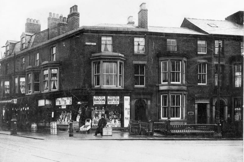 Abingdon Street shop scene in 1930s at the corner of Clifton Street. Bacon and butter