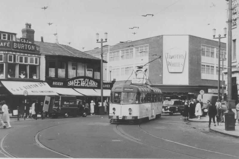 Timothy Whites Chemist which ended up as Harvey's Furniture Shop on the corner Birley Street 