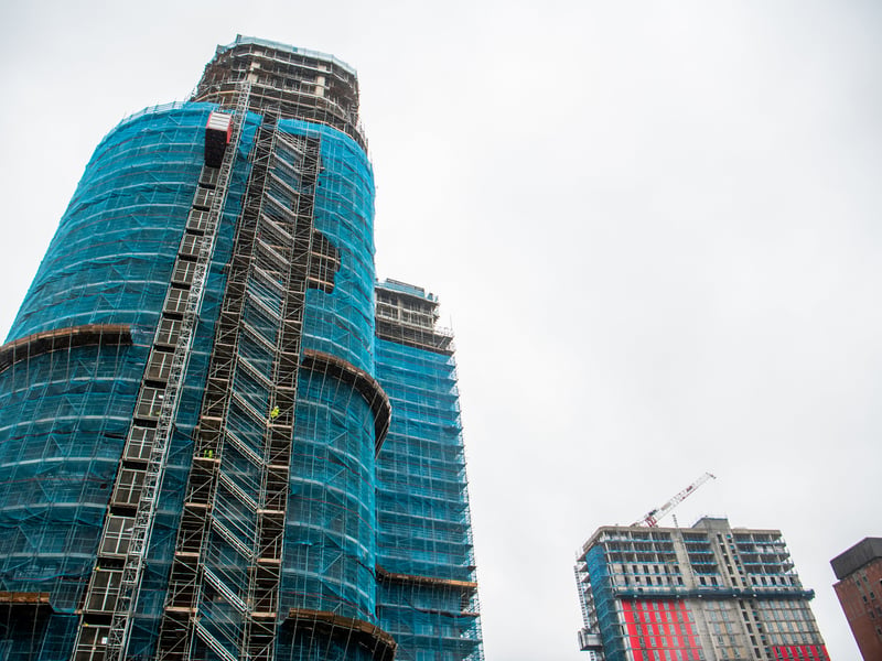 Construction of a large 31-storey residential tower block is ongoing