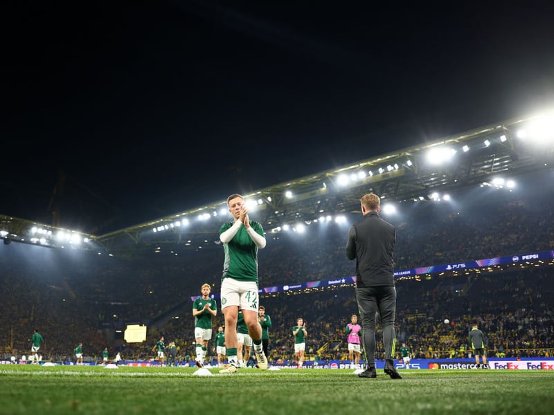 Captain Callum McGregor applauds the fans prior to kick-off in Dortmund.