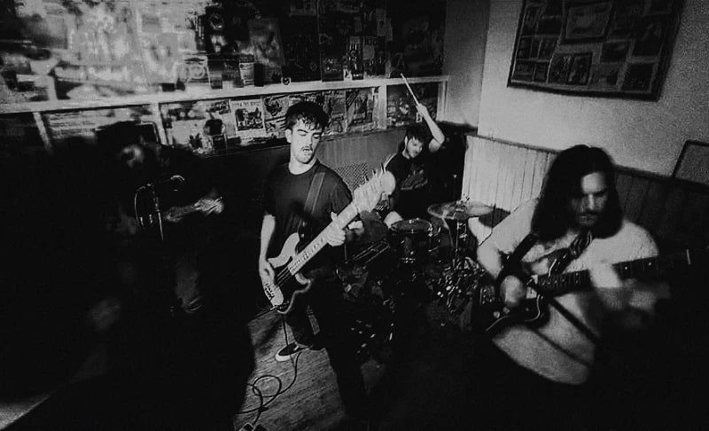Chalk Hands is a UK-based post-hardcore band known for their emotional intensity and dynamic sound, blending heavy, cathartic moments with quieter, atmospheric sections