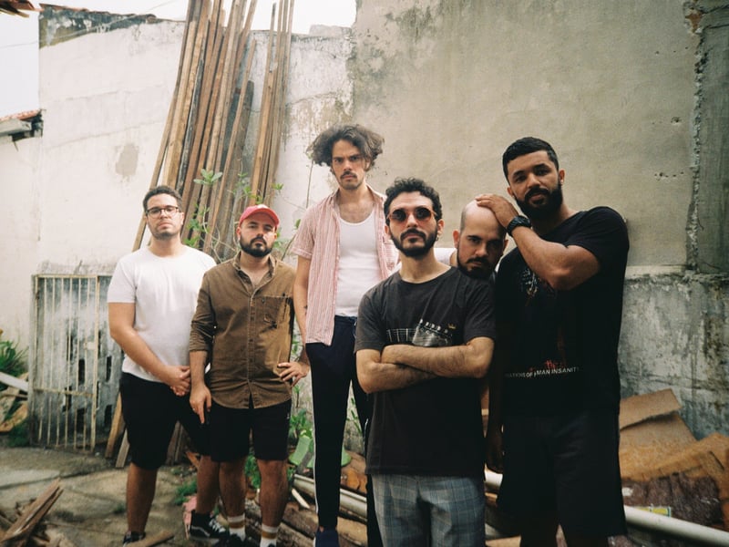 Papangu is a Brazilian band blending progressive rock, doom, and Brazilian folk influences. Their sound is both heavy and intricate, with an experimental edge