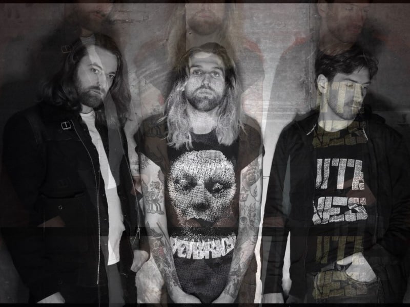 Tayne is a London-based industrial noise project, combining dark electronic beats with aggressive vocals and harsh, metallic sounds. Their music is intense, with a dystopian, futuristic aesthetic