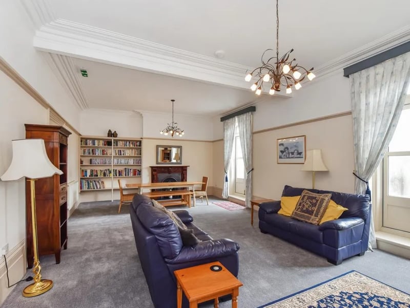 The listing says: "The property's Victorian heritage shines through, adding character and a sense of history to the home. Imagine hosting gatherings in the spacious reception rooms or enjoying the sea views from the balcony on a sunny afternoon."