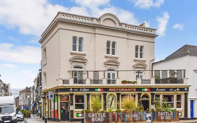 This home comes with seven bedrooms, three bathrooms and two reception rooms.