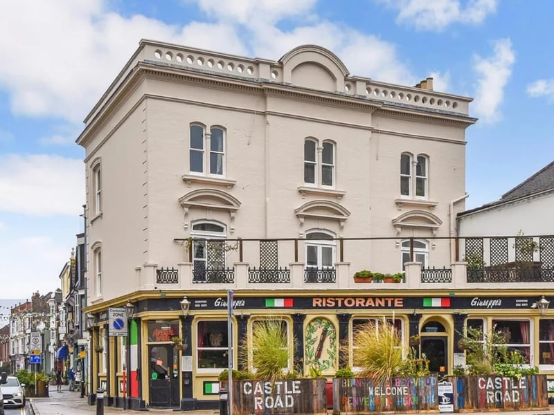 This home comes with seven bedrooms, three bathrooms and two reception rooms.