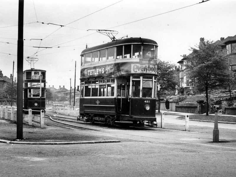 Easterly Road from the junction with Roundhay Road in July 1950. Tram tracks run in the central reservation; this is the Harehills terminus. Two trams can be seen, in the front ex-Hull no.455 on route 4 to Kirkstall Abbey, and at the back Horsfield tram no.232.