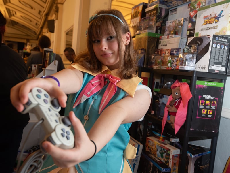 A young gamer girl poses for the camera
