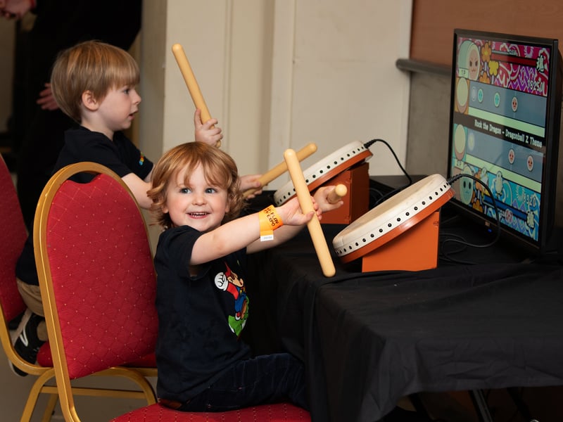 Two little ones enjoy a game