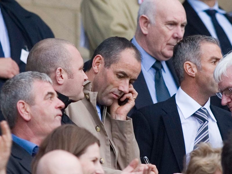 Rangers manager Paul Le Guen (centre) sits next to Dundee United counterpart Craig Brewster to watch his countrymen play Scotland.