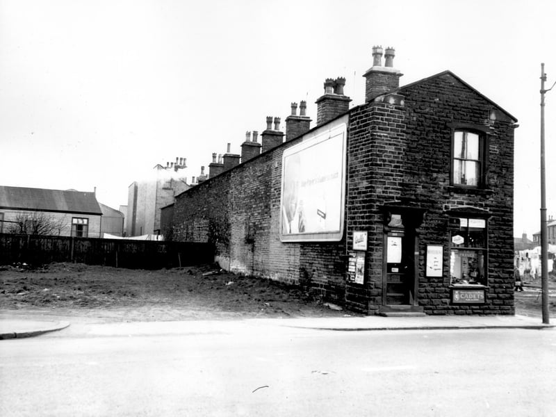 A newsagents shop on Stanningley Road, business of W. Pullan. The back view of houses on Scarbro Terrace is to the left, the waste ground had been the site of a blacksmiths forge. Pictured in April 1964