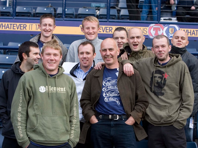 Supporters in Hampden pose for a photo ahead of the game.