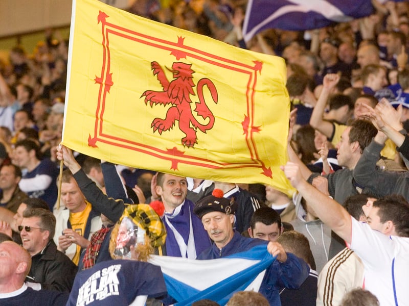 Scotland supporters fly the flag after the 1-0 win over France at Hampden.
