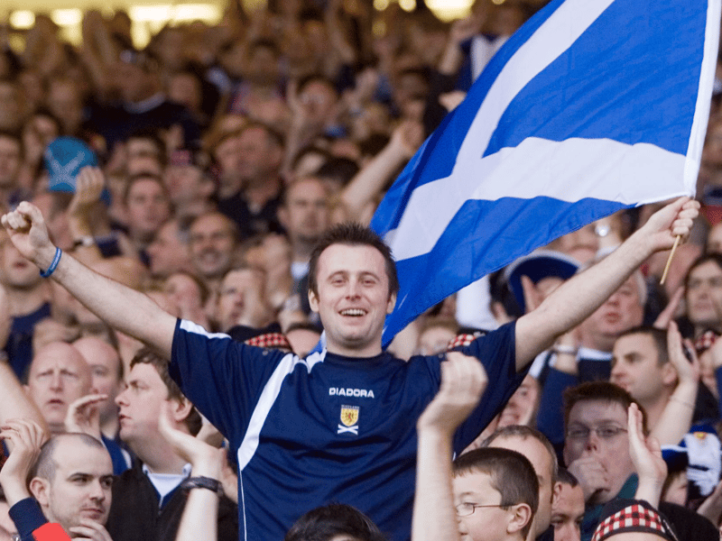 Scotland fans show their delight at a home victory over the World Cup finalists.