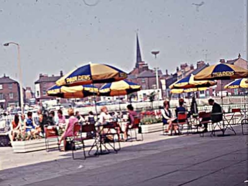 The pedestrian precinct and tea garden cafe outside Paulden's department store, Charter Square, during the football World Cup in 1966