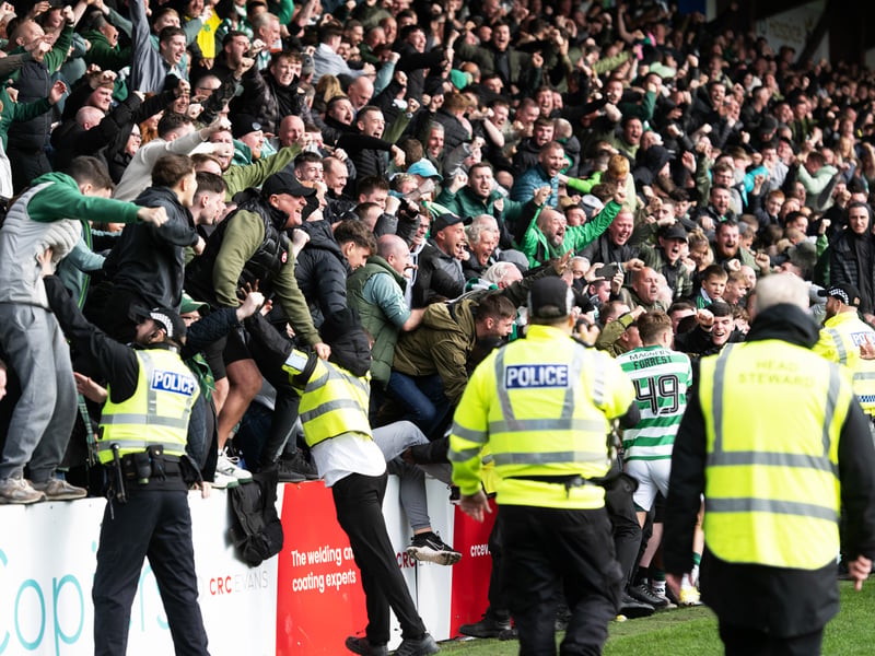 The Celtic support are sent into ecstasy after Nicolas Kuhn's late winning goal.