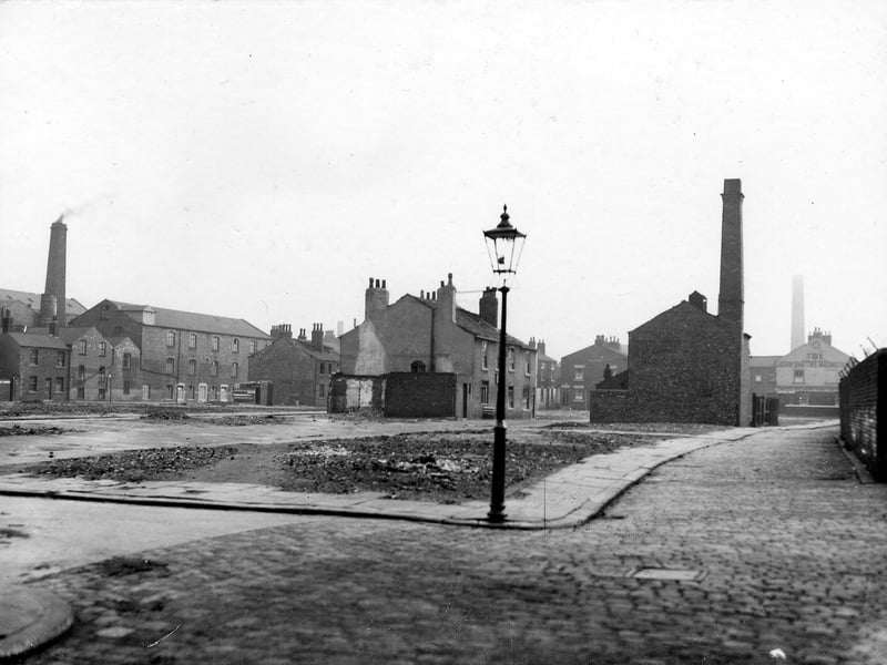 Camp Fields area after housing clearance in September 1938, showing public houses and remaining mills. The Grove Inn can be seen at the bottom of Back Row, Bricklayers Arms in the middle of Middle Row. Hope Mills, which at this time housed Denby and Spinks, upholstery works, is on the far left, on Front Row.