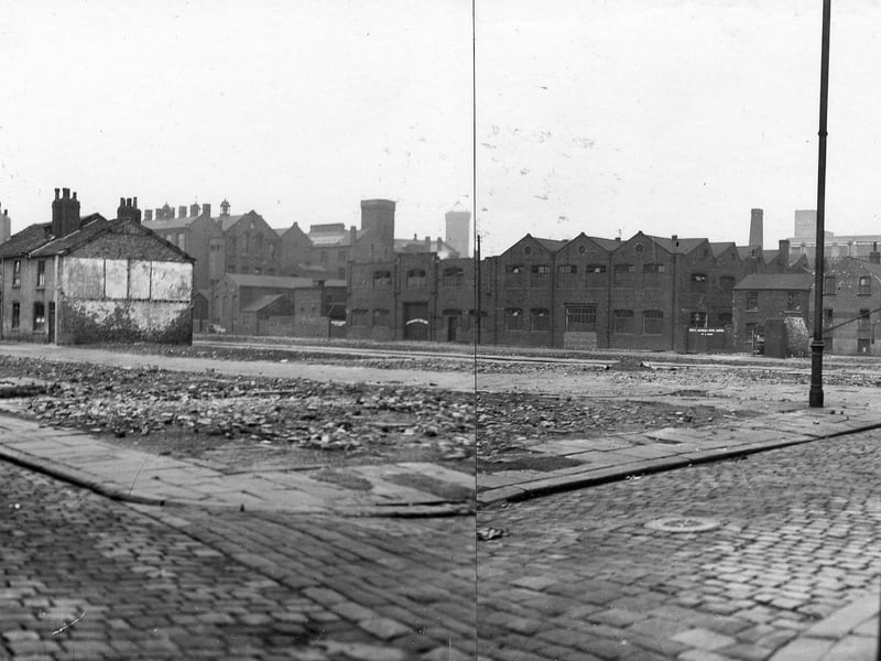 Camp Fields clearance from Back Row and Stone Row looking across to David Street and Front Row. Bricklayers Arms on the left and the Carpenters public house on Front Walk, on the right. Leeds Industrial Co-operative Society bakery and Victoria Engineering works can be seen on Front Row. Pictured in September 1938.