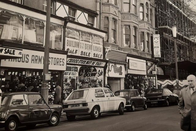 Remember Famous Army Stores? Walco and a sale going on in one shop in this Victoria Street scene from 1976. Scaffolding shrouds the construction of the building at the end