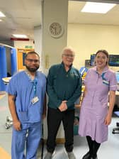 Christopher Wild (centre) with consultant cardiologist Dr Javaid Iqbal and staff nurse Victoria Shackley, just before he was discharged home