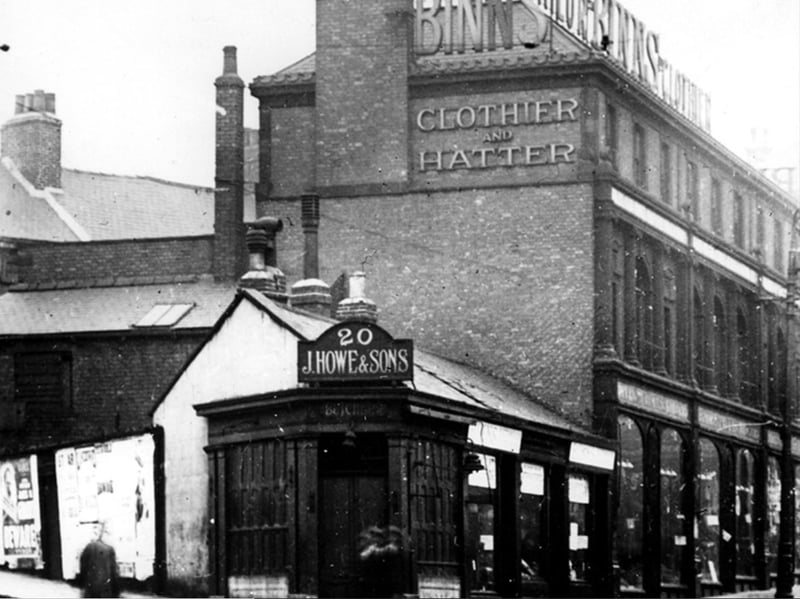 South Street (later The Moor), at the junction with Carver Street, showing James Howe and Sons, butchers; and George Binns, tailors