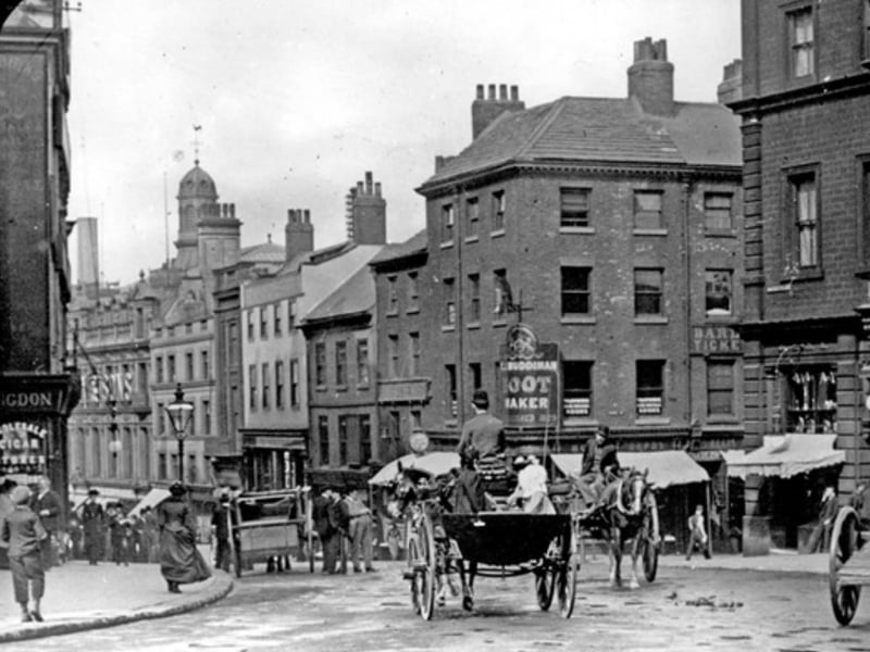 Market Place and Angel Street. Sheffield city centre, showing Charles J. Muddiman, bootmaker, and Fitzalan Market Hall