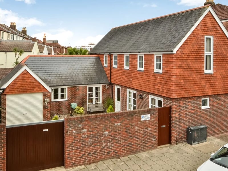 The listing says: "A unique opportunity to acquire a detached Coach House that was built in 1995 to a bespoke architectural design, the L shaped accommodation is arranged over two floors, providing 1403 sq ft of living space over two floors."
