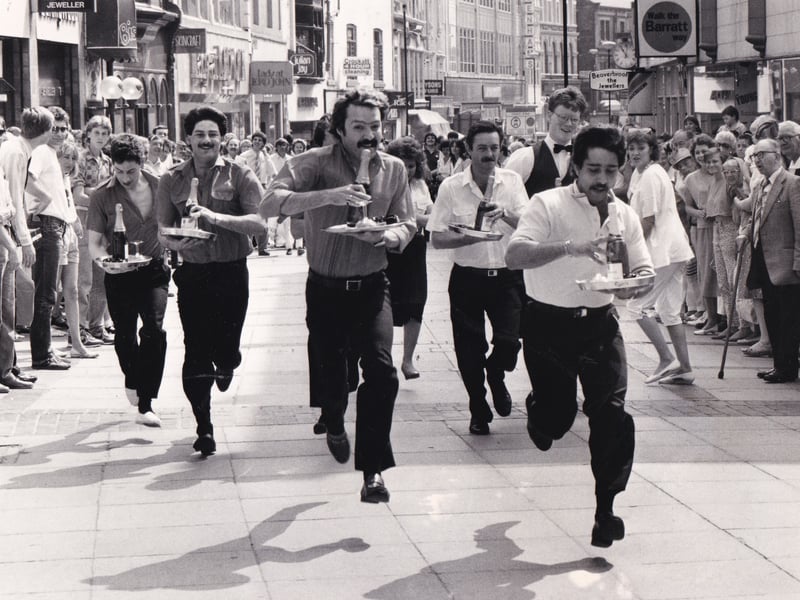 Shoppers came to a standstill in June 1986 as a group of waiters showed their racing skills. The first ever Leeds waiters' race, a curtain raiser to the Lord Mayor's Parade was stated by Miss Leeds Metro '86 Julie Garnett.
