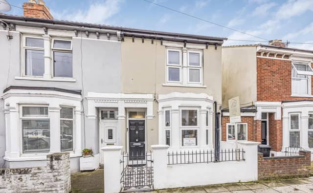 The listing says: "Wonderful three bedroom end-terrace home with summerhouse/cabin in the garden with power. Close to the park and local schools."