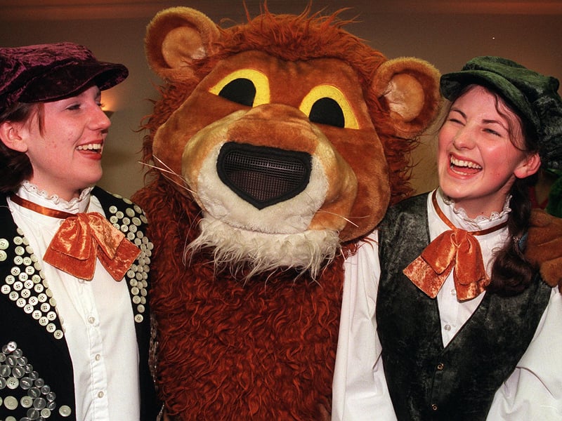 Amy Crookes and Laura Howe with Lenny the Lion, part of the Christmas procession at Meadowhall in 1998