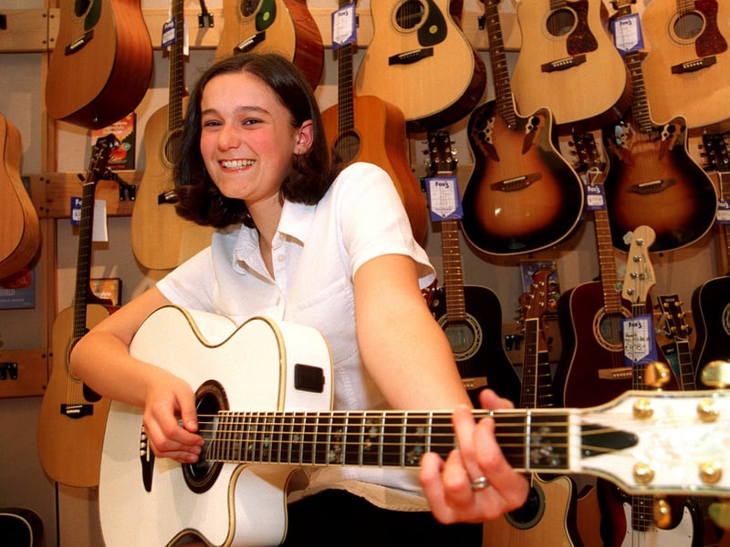 Pictured at Fox's Music store, Meadowhall, where she works is schoolgirl Felicity Down, 16, who is a regional winner of Nationwide awards for voluntary endeavour. She plays a lot of musical instruments.