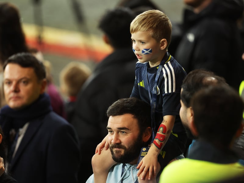 A young fan gets ready for kick-off at Hampden Park.