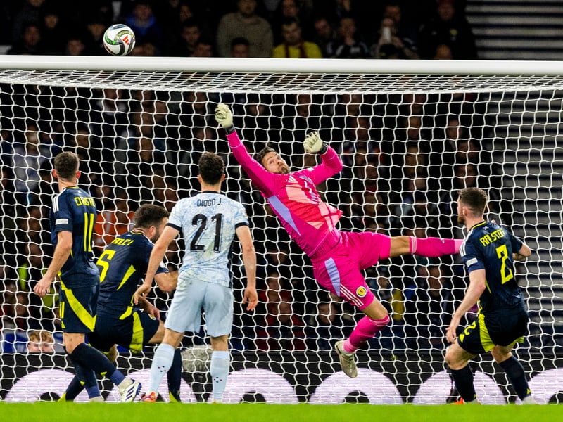 Made a good save from Nuno Mendes' first-half free-kick, but his kicking left a lot to be desired and invited pressure onto the Scotland back line too often during the first 45. However, his late save from Bruno Fernandes safeguarded a point for Scotland.