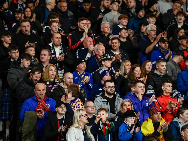 Scotland fans during a minute's applause for former First Minister Alex Salmond.