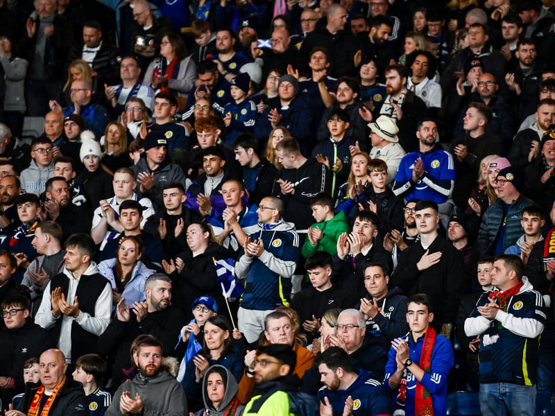 Scotland fans during a minute's applause for former First Minister Alex Salmond.