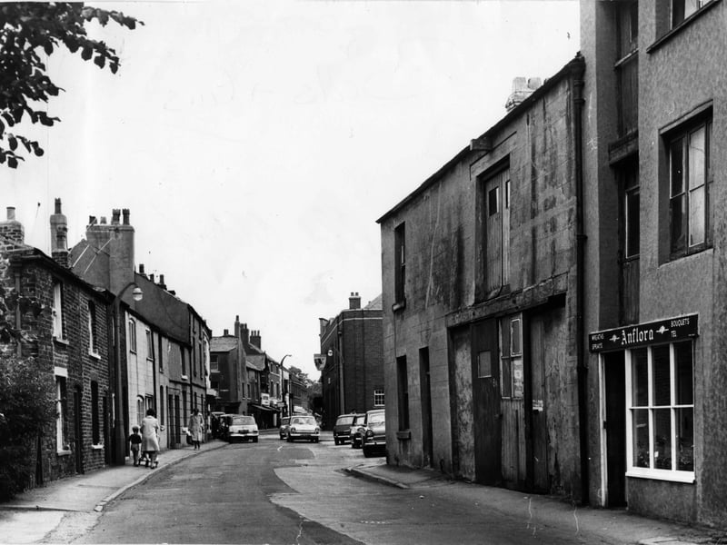 Blackpool Old Road looking towards the Market Place and Queens Square in 1968 before the one way traffic system. The building on the left on the corner of the Market Place was Richard's the ironmongers, which stocked everything that a farmer might need, plus domestic items. Next door on Blackpool Old Road was the Stocks Press and then the Old England Confectioners. Both were later demolished. The buildings on the right have been replaced with shops and offices, but the Bull Hotel is still a popular watering hole.