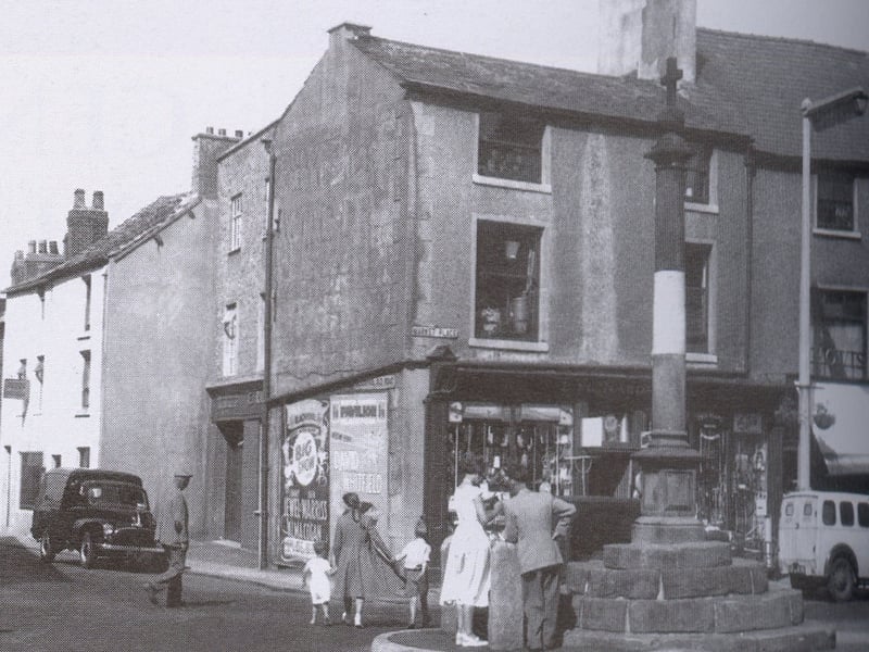 Poulton-le-Fylde market place in 1955, at the junction with Blackpool Old Road. On the corner was Richard's the ironmonger's, which stocked everything that a farmer might need, plus domestic items. Next door on Blackpool Old Road was the Stocks Press and then the Old England Confectioners