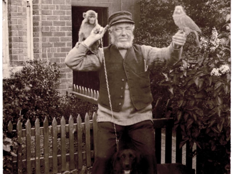 Captain Peter Harrison with pets outside his home Pool Cottage, Skippool 