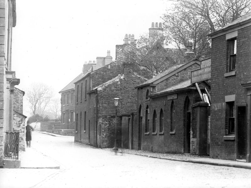 Ball Street before demolition work in 1910 looking towards the junction of Breck Road (left), Chapel Street (right) and Vicarage Road