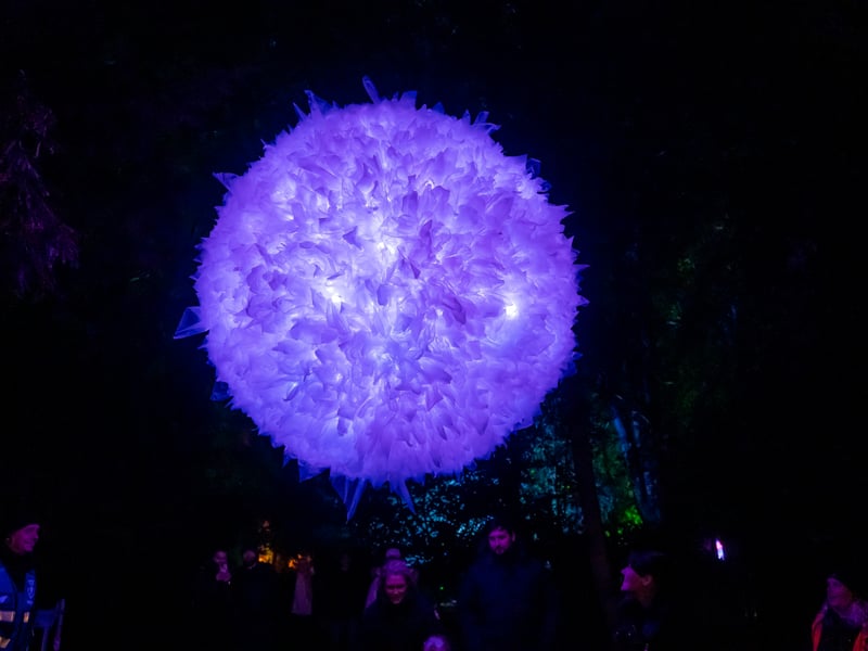 Crafted from recycled plastics, Valkyrie is a huge suspended glowing orb which responds to sound and voices. Inspired by the Northern Lights, visitors will be able to create their own aurora by speaking into the sculpture, creating new colours to ripple across its surface. There will also be some short performances taking place under the sculpture.