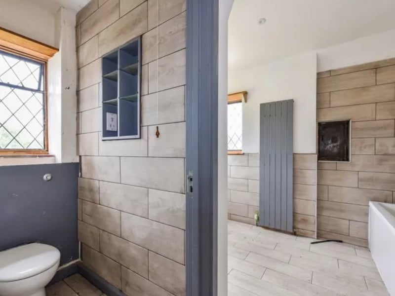 This home comes with nine bedrooms, four bathrooms and three reception rooms.