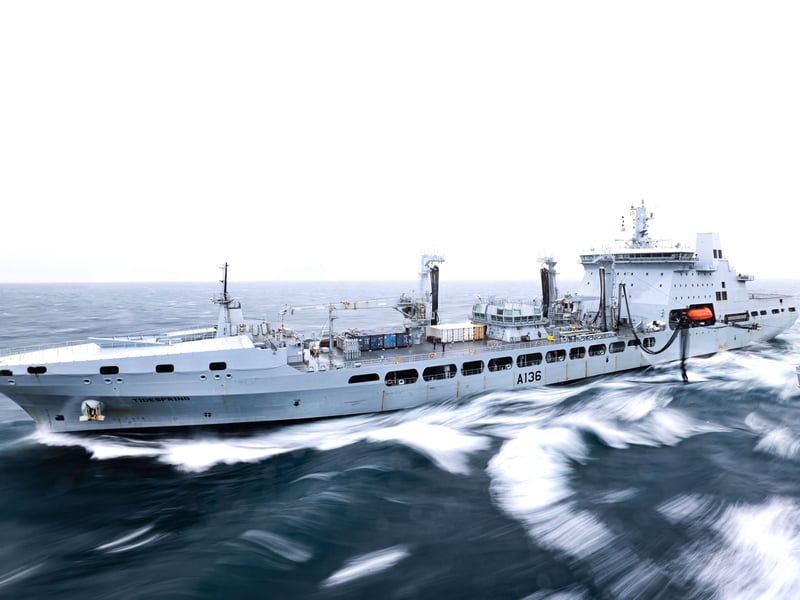 Pictured: RAF Tidespring and HMS Prince of Wales during a RAS. RFA Tidespring and HMS Prince of Wales conduct a RAS (Replenishment at Sea) in order to take on more fuel.