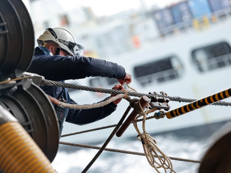 Pictured: Seaman Specialist prepares the ropes to take to fuel probe. RFA Tidespring and HMS Prince of Wales conduct a RAS (Replenishment at Sea) in order to take on more fuel.