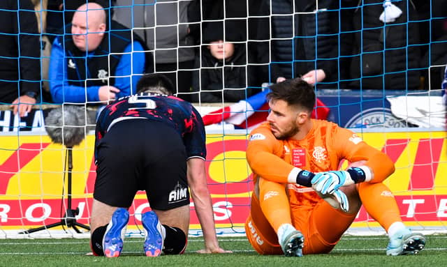 Rangers defender John Souttar (left) and goalkeeper Jack Butland are left on the deck after Kilmarnock's Marley Watkins scores an 88th minute winner. (Photo by Rob Casey / SNS Group)