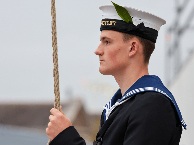 A member of HMS Victory's ships company as part of the colours party for annual Trafalgar day ceremony.