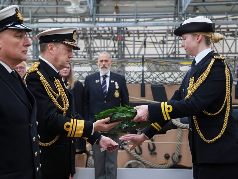 Pictured- Senior officer gives wreath to Second Sea Lord, Vice Admiral Martin Connell for Trafalgar Day ceremony.